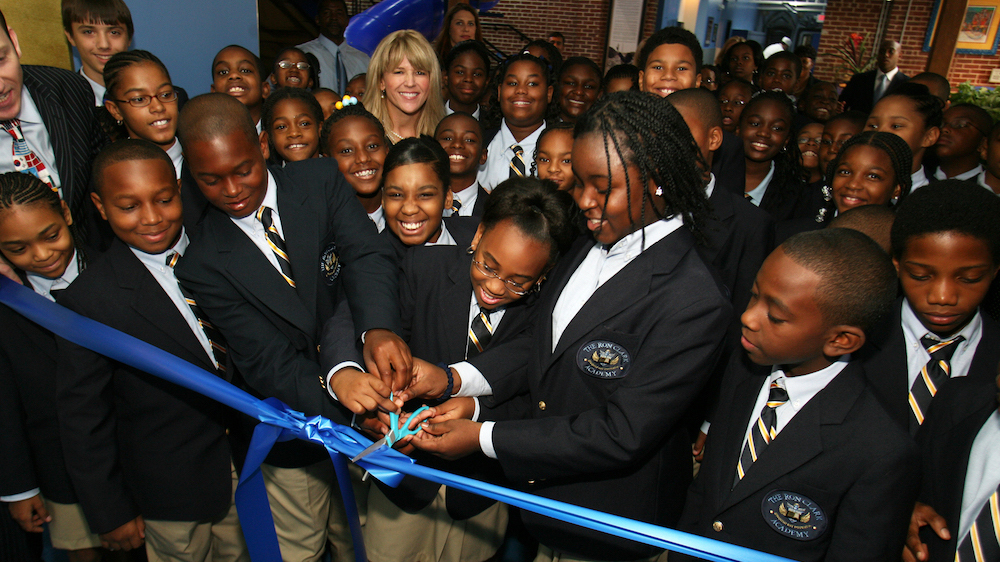 070904 Atlanta, GA:  Along with teachers, 60 students cut the ribbon on the first day of school for the Ron Clark Academy, a private middle school in Southeast Atlanta, on September 04, 2007.  While the Roswell High School marching band played, students officially entered the school and slid down the school's slide.  Ron Clark, a former Disney Teacher of the Year, plans to take his students on international "travel-study adventures."  (JESSICA MCGOWAN/Special)